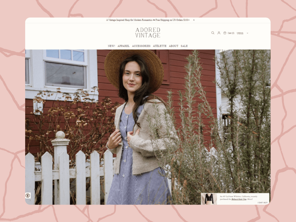 Screenshot of the Adored Vintage website featuring a model in vintage clothing, encapsulating their classic style offerings